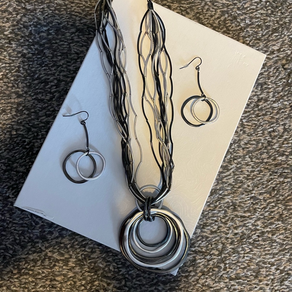 Womens stylish necklace and matching earrings-never worn!